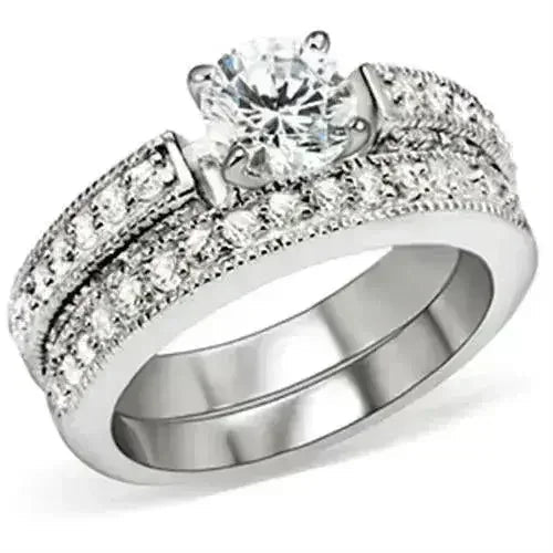 5X016 Rhodium Brass Ring – 6.5mm AAA Clear CZ Solitaire (Bold & Brilliant)